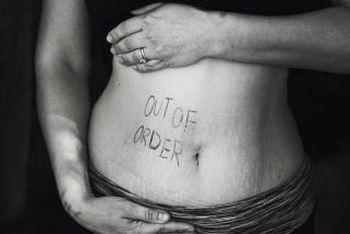 Out of Order Text on Persons Belly