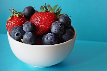 Blueberries and Strawberries in White Ceramic Bowl